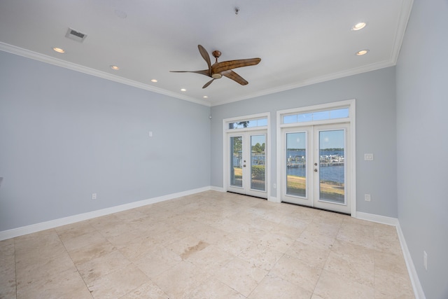 unfurnished room featuring ceiling fan, ornamental molding, and french doors