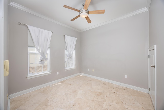 empty room featuring ceiling fan and ornamental molding