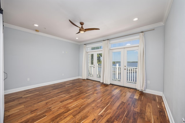 unfurnished room with french doors, crown molding, dark hardwood / wood-style floors, and ceiling fan