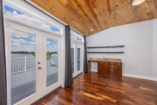 interior space featuring french doors, lofted ceiling, dark wood-type flooring, and wood ceiling