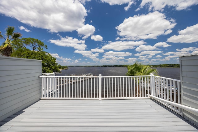 deck featuring a water view