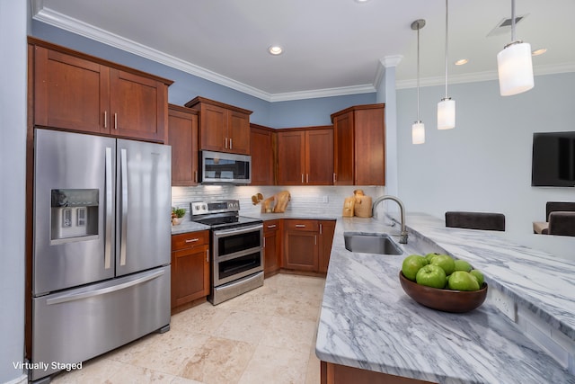 kitchen featuring tasteful backsplash, stainless steel appliances, light stone countertops, decorative light fixtures, and sink