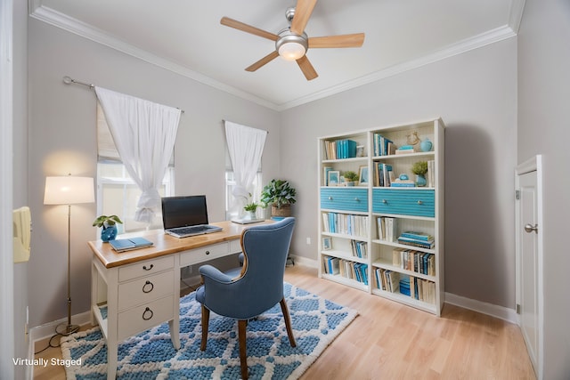 office area featuring ceiling fan, light hardwood / wood-style floors, and crown molding