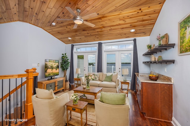 living room featuring french doors, dark wood-type flooring, wood ceiling, and lofted ceiling