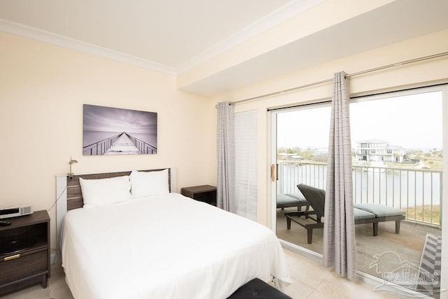 bedroom with ornamental molding, a water view, and access to outside