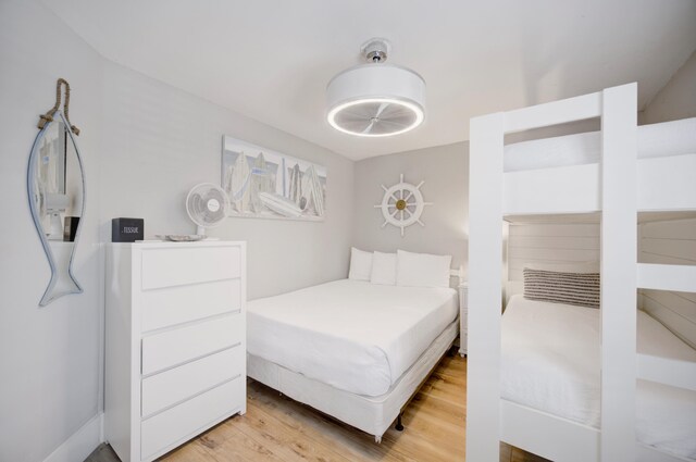 bedroom with light hardwood / wood-style flooring