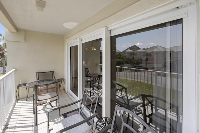 balcony featuring a sunroom