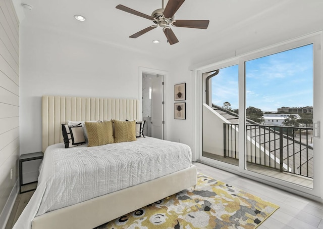 bedroom with access to outside and ceiling fan