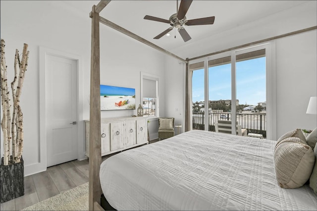 bedroom with ceiling fan, light hardwood / wood-style floors, and access to outside