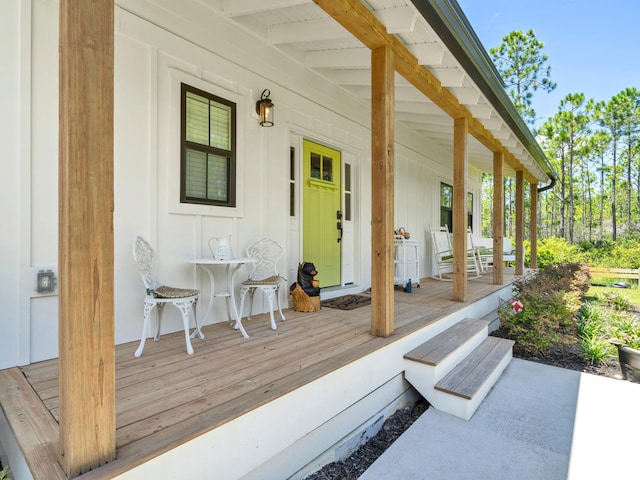 wooden deck featuring covered porch