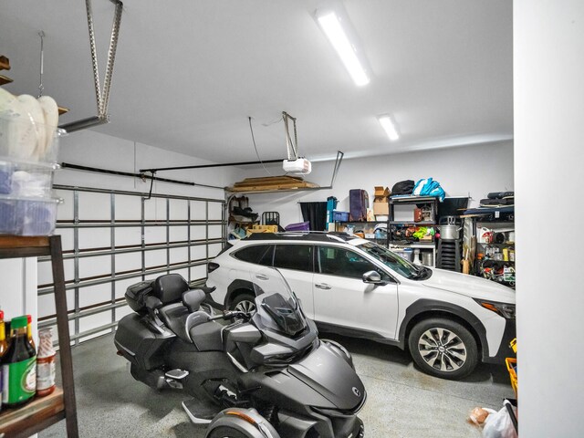 garage featuring a garage door opener