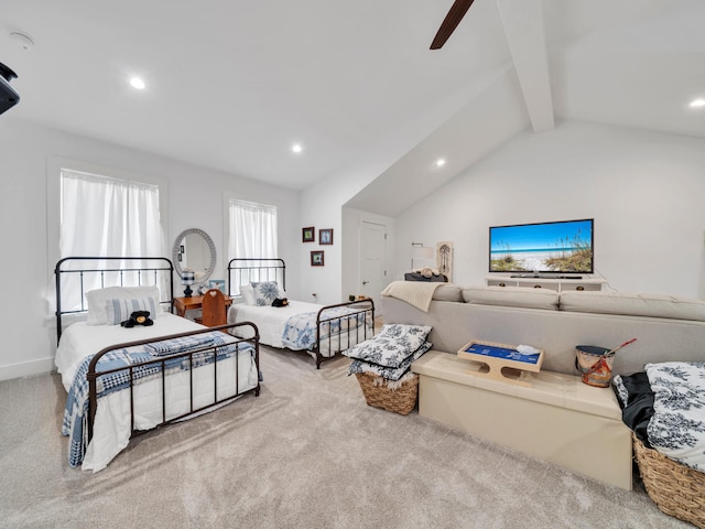 carpeted bedroom featuring vaulted ceiling with beams and ceiling fan