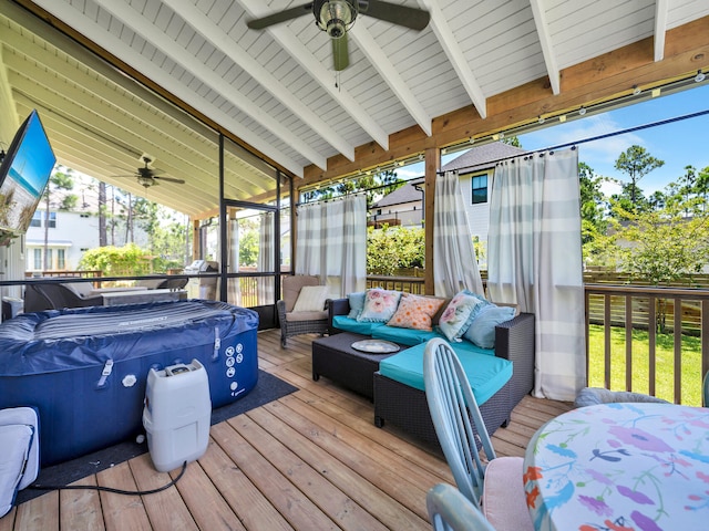 wooden terrace with ceiling fan and outdoor lounge area