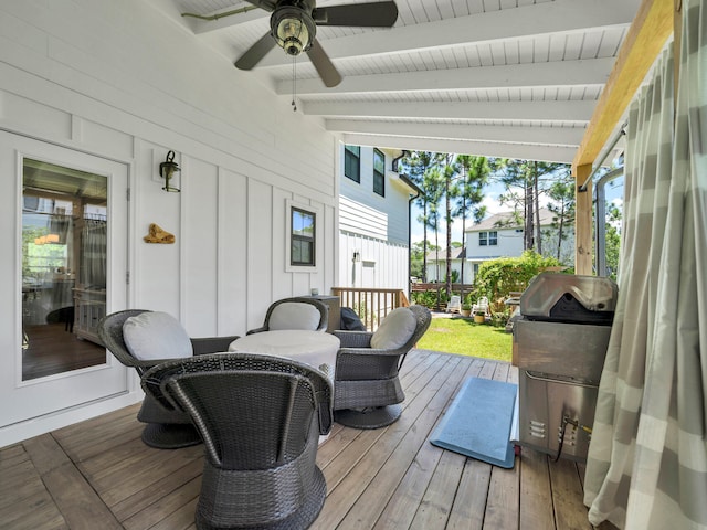 wooden deck with ceiling fan