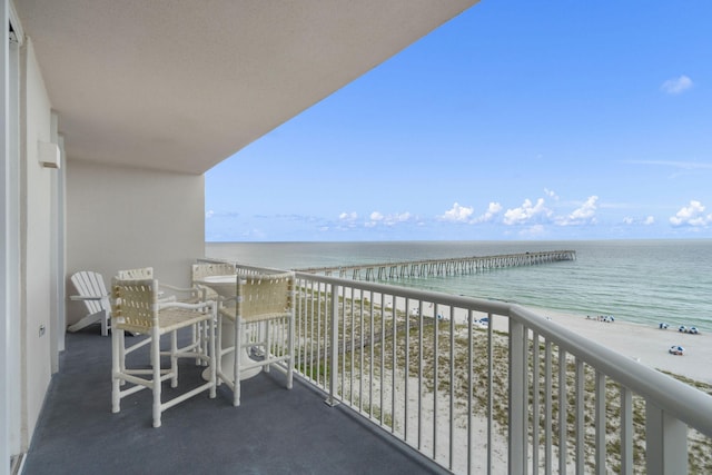 balcony featuring a water view