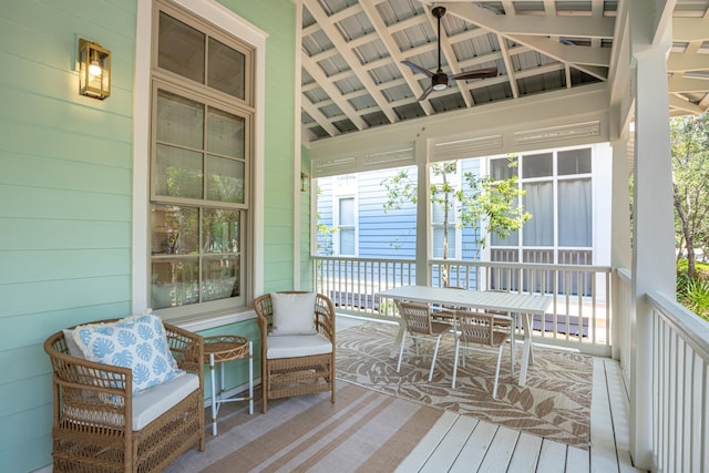 wooden deck with ceiling fan