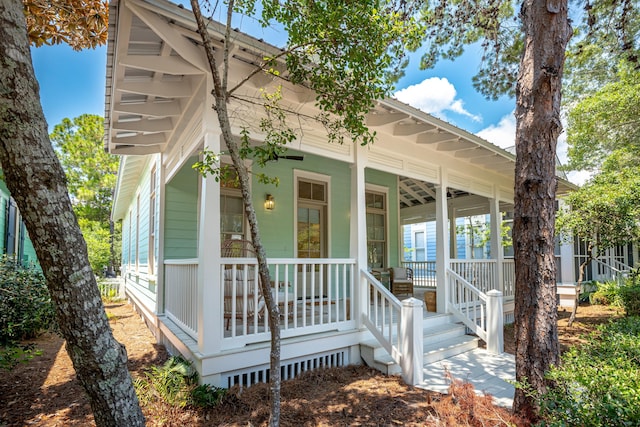 doorway to property with a porch