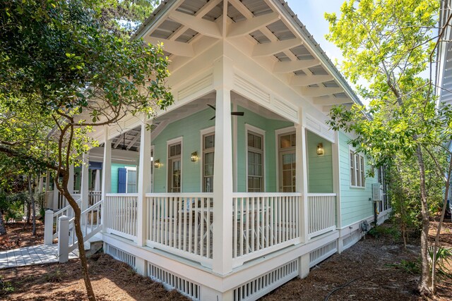 view of property exterior with covered porch