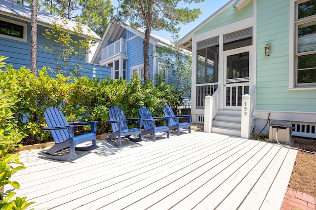 deck featuring a sunroom