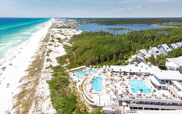 bird's eye view featuring a beach view and a water view