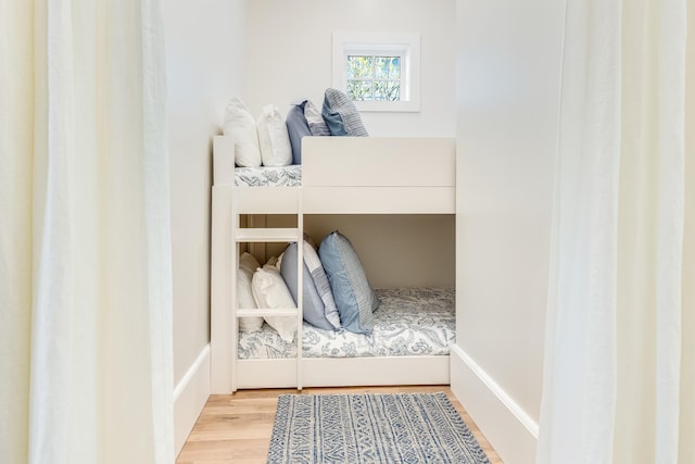 bedroom featuring light wood-type flooring