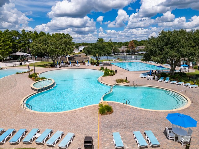 view of pool featuring a patio area