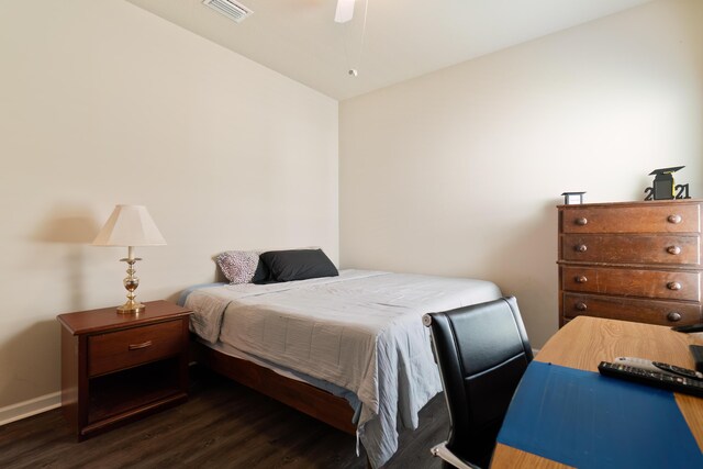 bedroom featuring ceiling fan and dark wood-type flooring