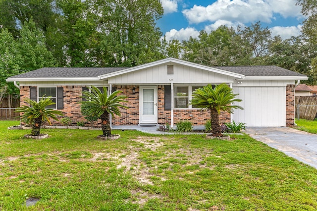 single story home with a front yard