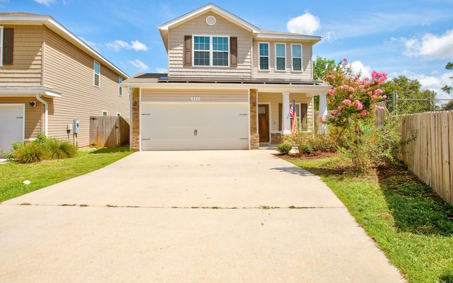 view of front of property featuring a garage