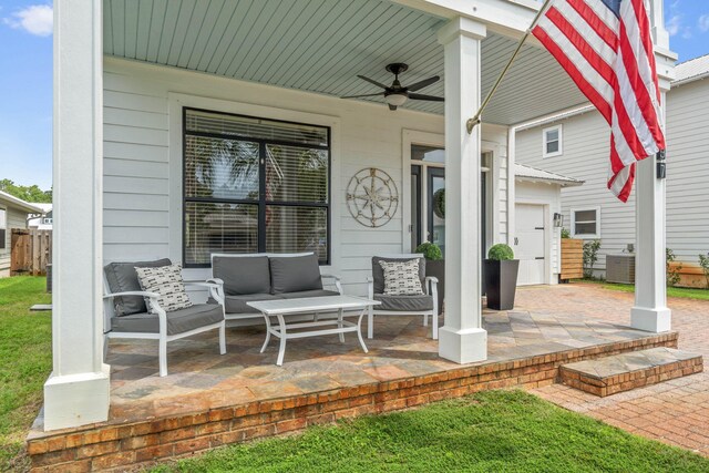 view of patio / terrace featuring ceiling fan