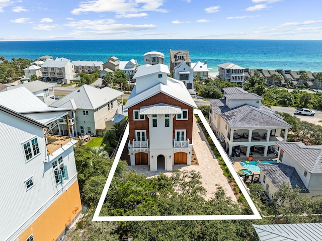 aerial view with a water view and a residential view