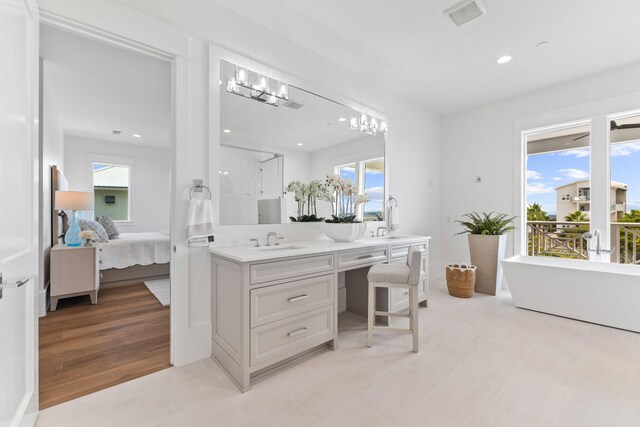 tiled office with sink and plenty of natural light