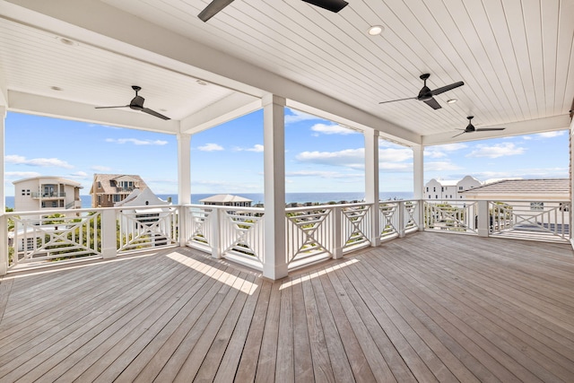 wooden terrace featuring ceiling fan