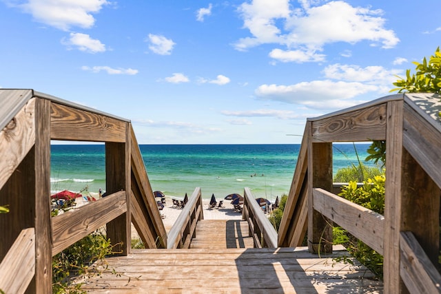 view of water feature with a beach view