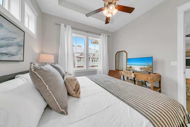 bedroom featuring vaulted ceiling and ceiling fan