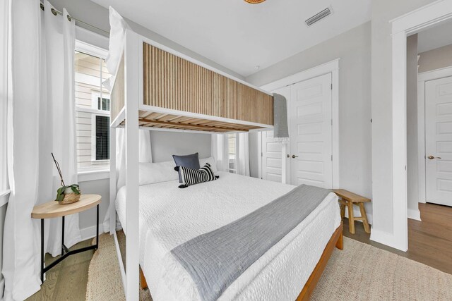 bedroom featuring light hardwood / wood-style flooring