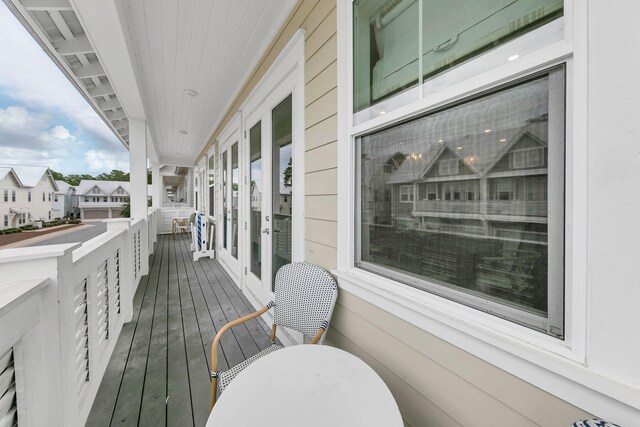 wooden deck featuring french doors