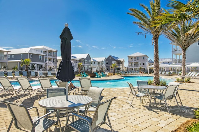 view of pool featuring a patio and pool water feature