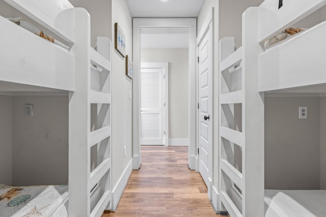 hallway with wood finished floors