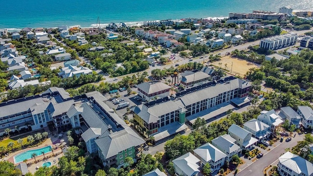 bird's eye view featuring a water view and a residential view