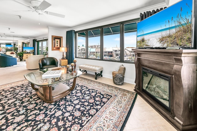 living room featuring tile patterned floors, ornamental molding, and ceiling fan