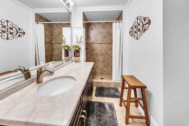 bathroom featuring ornamental molding, curtained shower, tile patterned flooring, and vanity