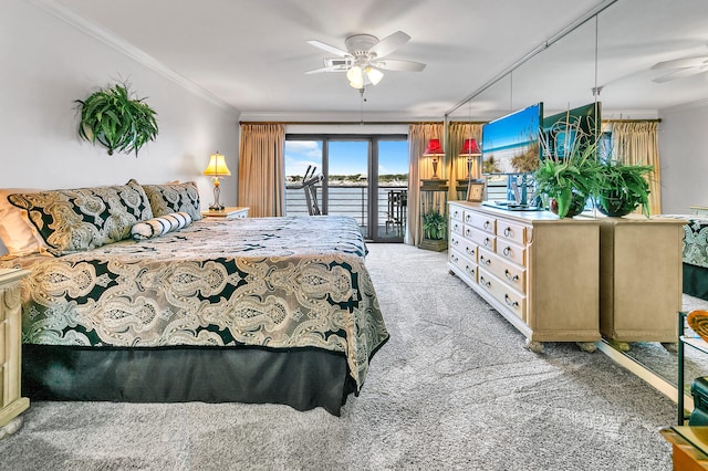 bedroom with ornamental molding, access to outside, and light colored carpet