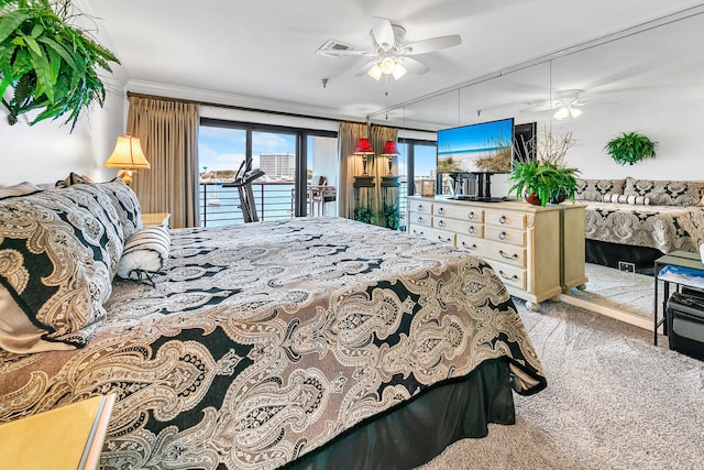 carpeted bedroom featuring ornamental molding, access to exterior, and ceiling fan