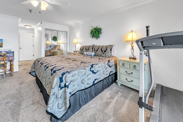 bedroom with light carpet, ornamental molding, a closet, and ceiling fan