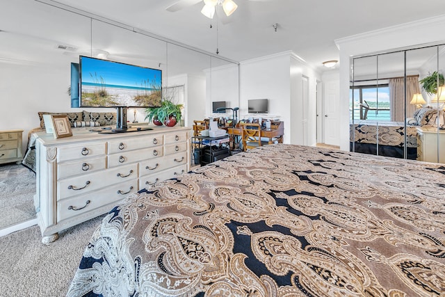 carpeted bedroom featuring ornamental molding