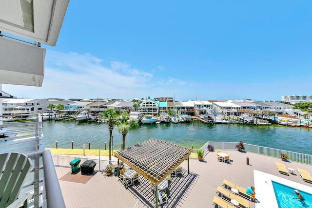 view of dock with a water view and a gazebo