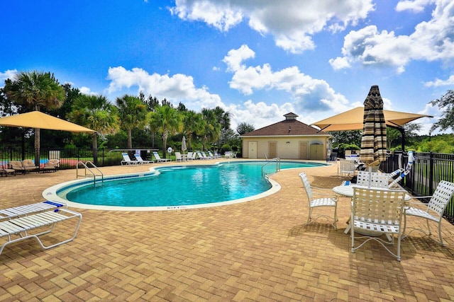 view of swimming pool featuring a patio