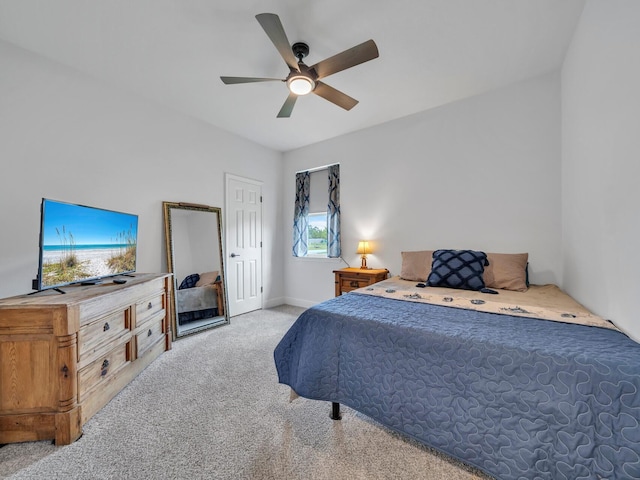 bedroom with ceiling fan and light colored carpet