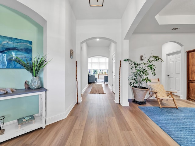 entrance foyer with light hardwood / wood-style floors